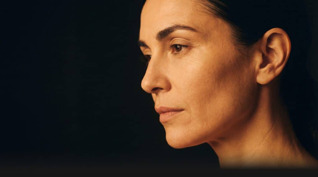 Side profile portrait of a woman for the Transform Beverly Hills face neck and brow lift hero image